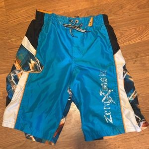 Blue kids size 10/12 swimming trunks with pockets